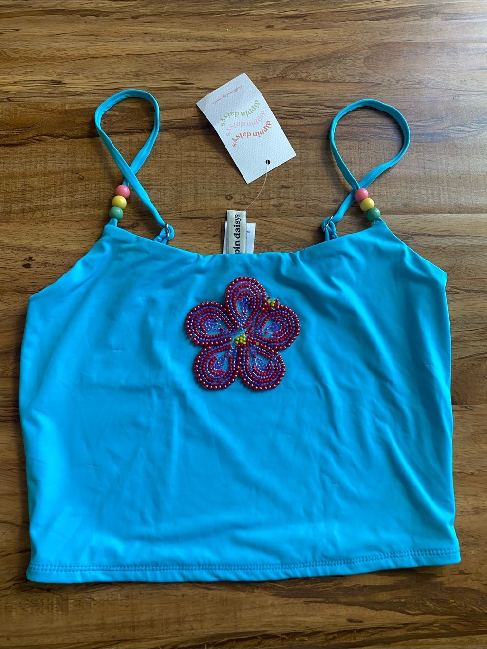 Dippin’ Daisy’s dazzle blue hibiscus Tommy tankini top S embellished beads NWT